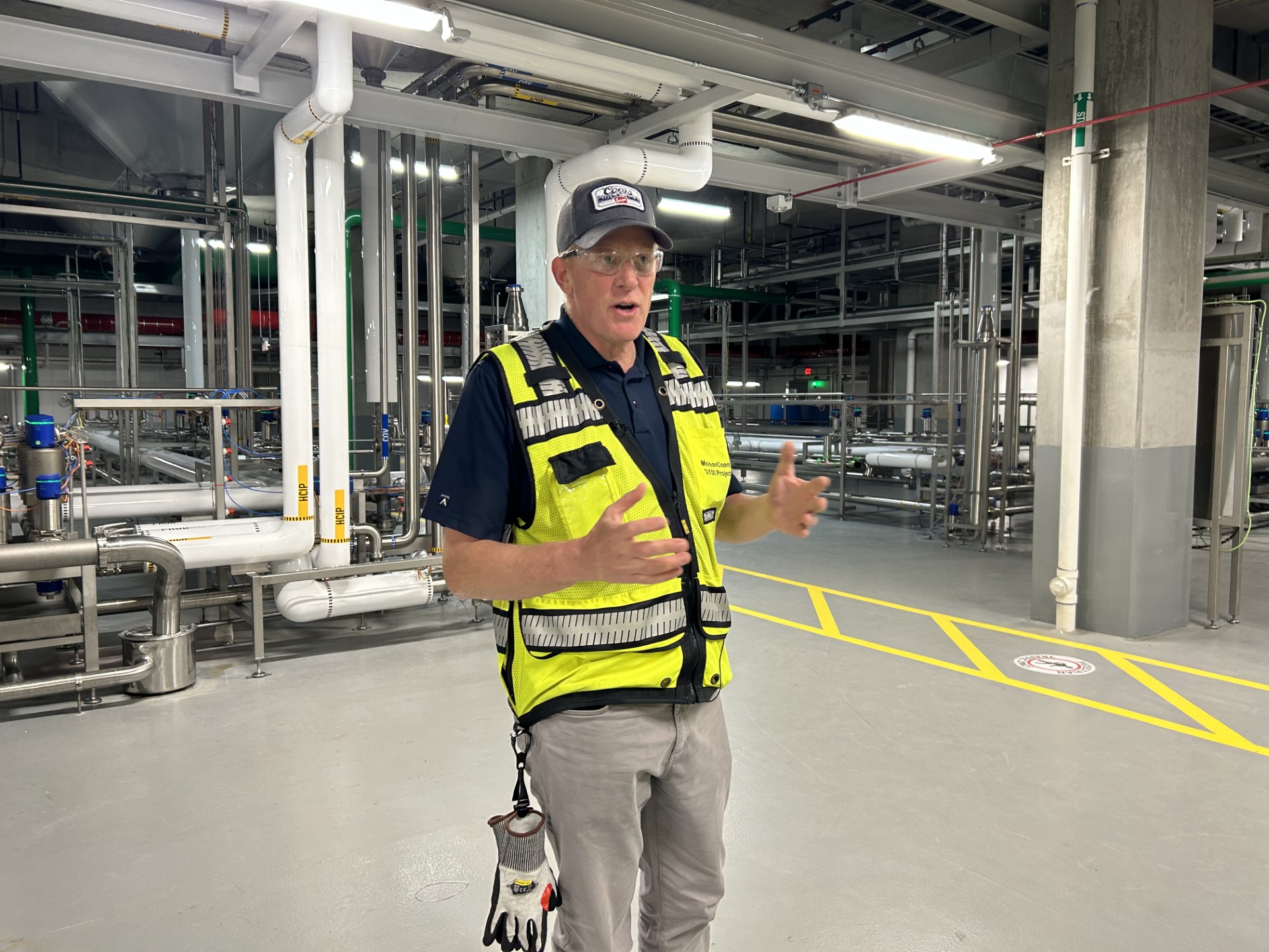 Peter Coors leads a tour through the new fermentation area.